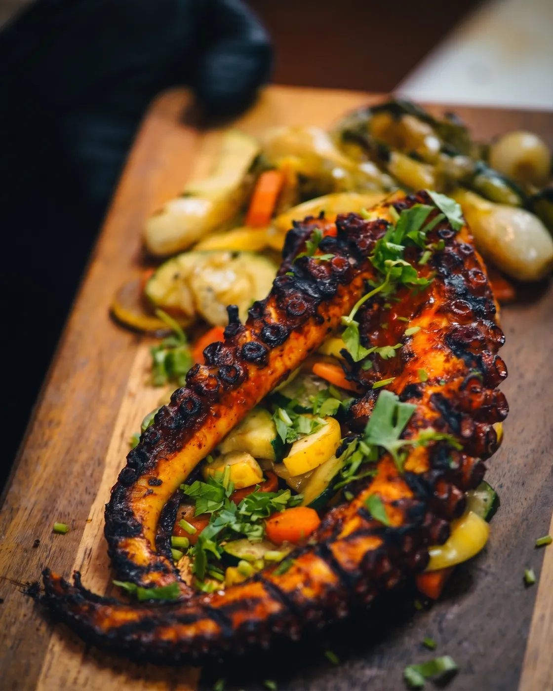 Pulpo Zarandeado — char-grilled octopus with roasted vegetables and aguachile cream